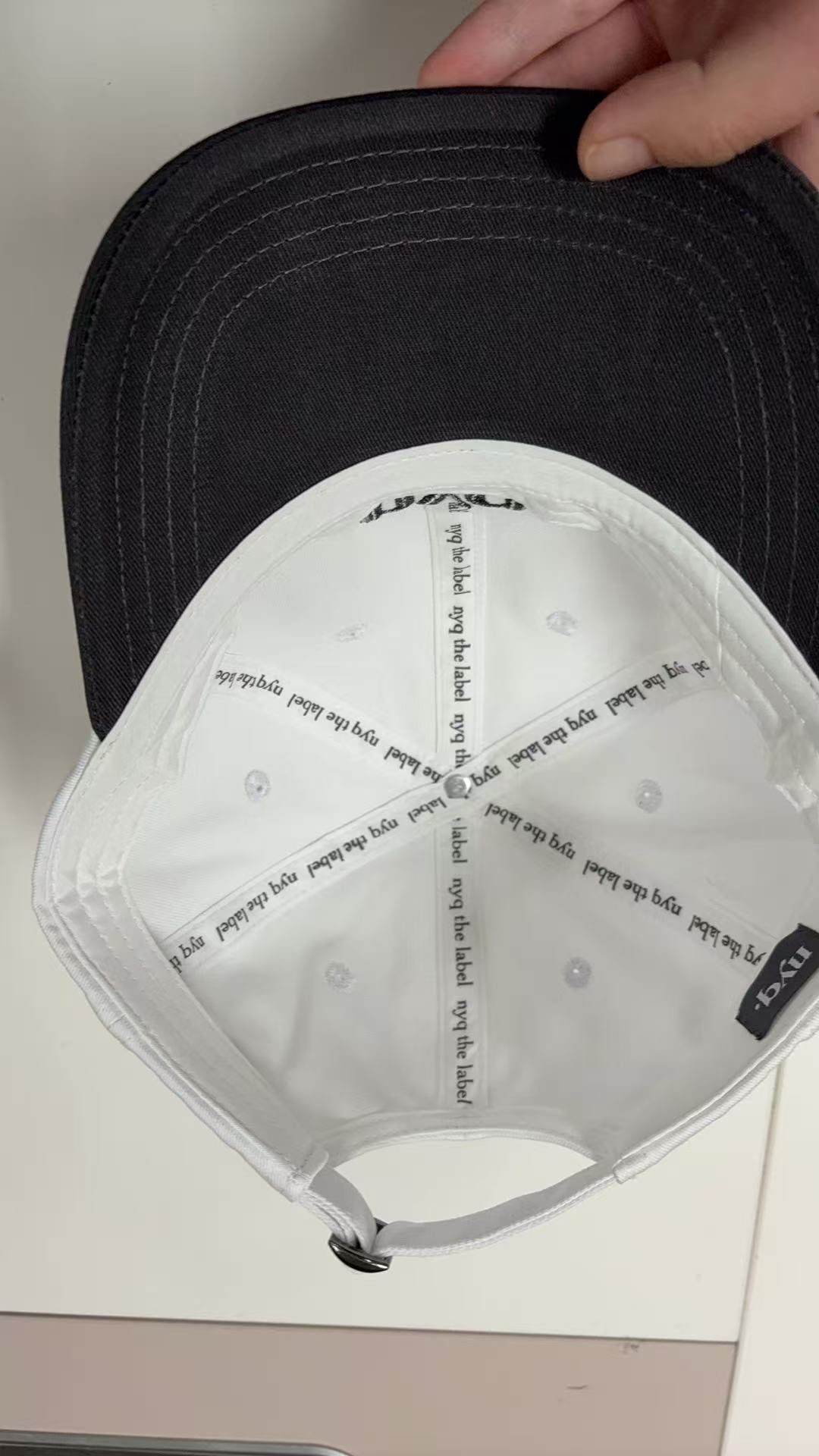 nyq signature hat.