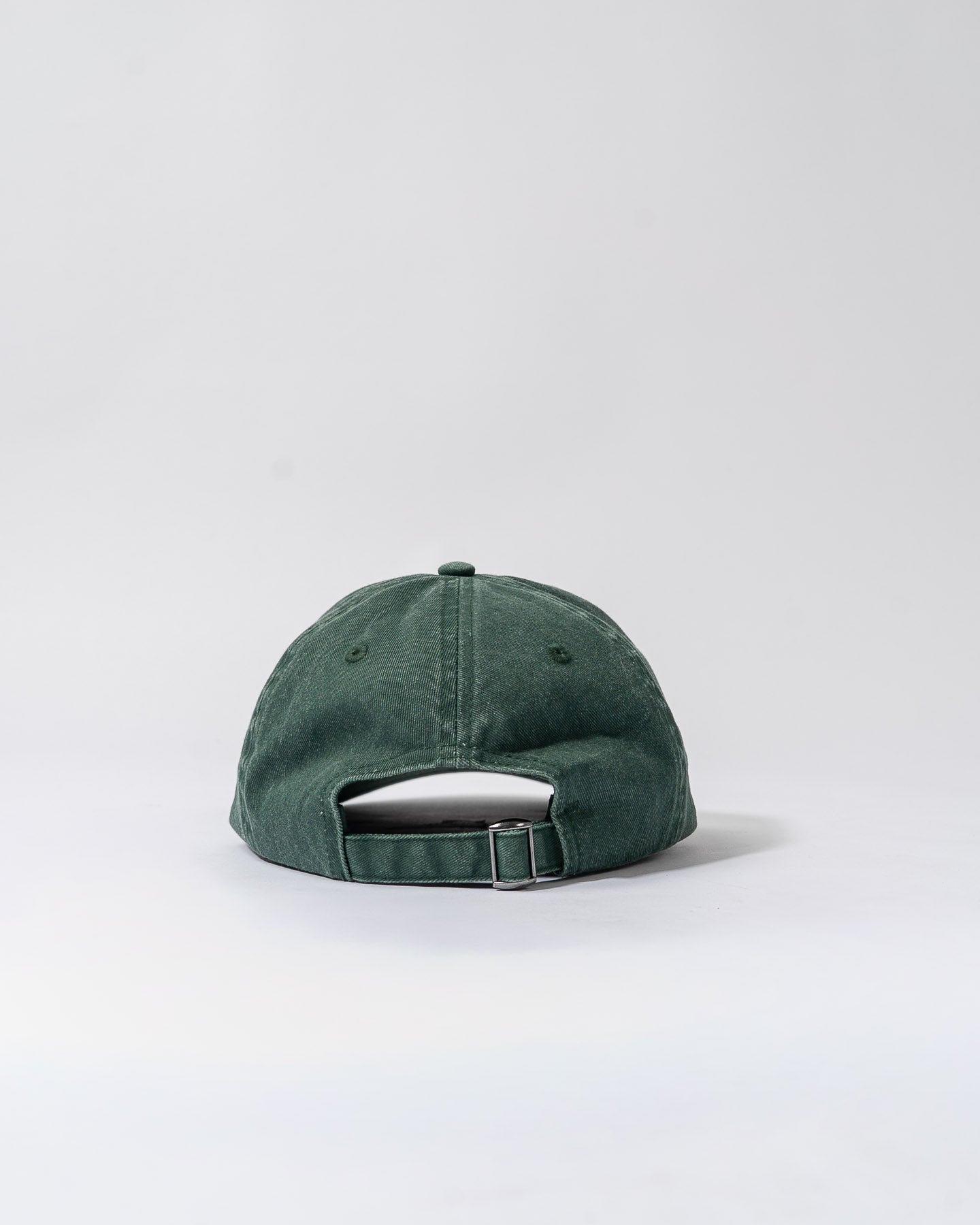 forest green cap.