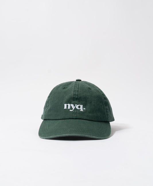 forest green cap.