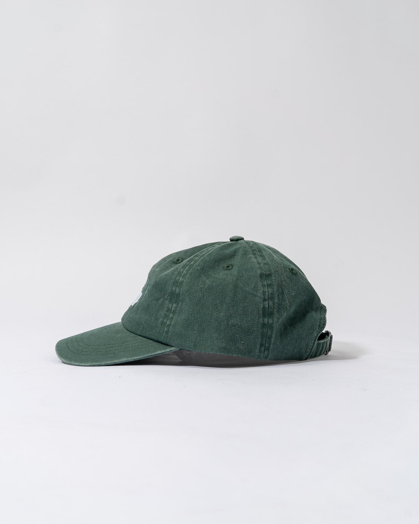 forest green cap.
